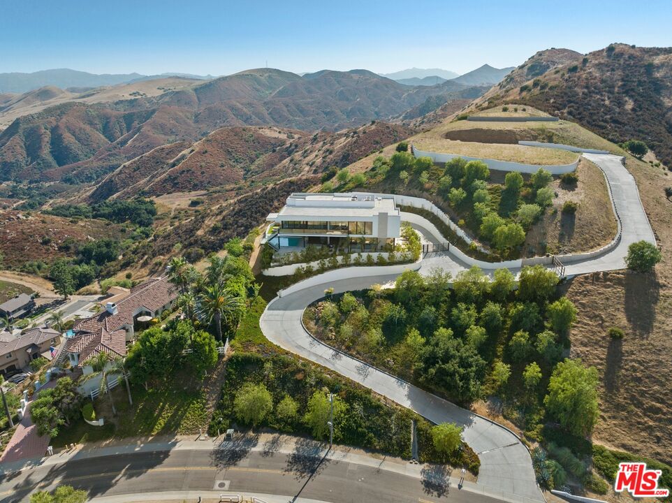 167 Saddlebow Road Bell Canyon, CA 91307 - Photo 30 of 33 an aerial view of a house with a garden