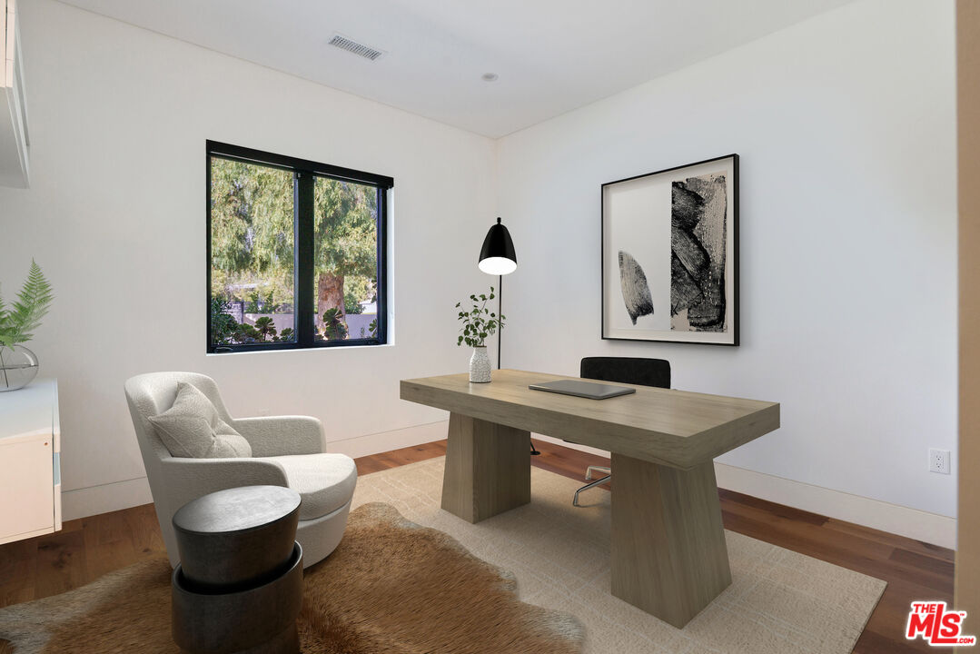 167 Saddlebow Road Bell Canyon, CA 91307 - Photo 33 of 33 a living room with furniture a rug and wall paintings