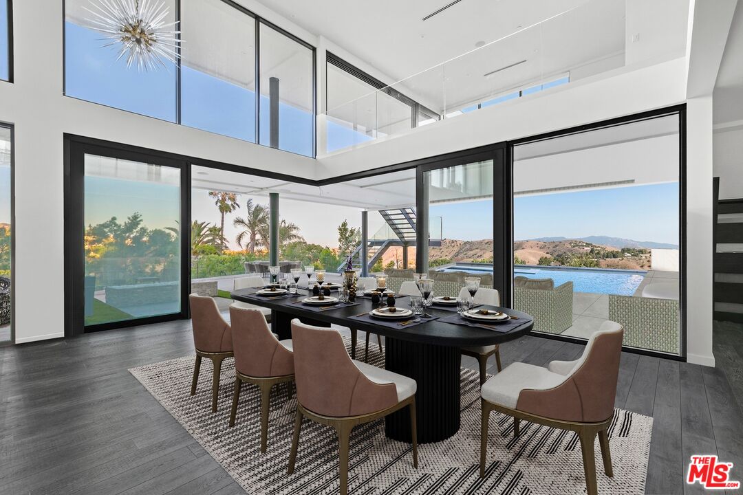 167 Saddlebow Road Bell Canyon, CA 91307 - Photo 4 of 33 a dining room with furniture window and wooden floor