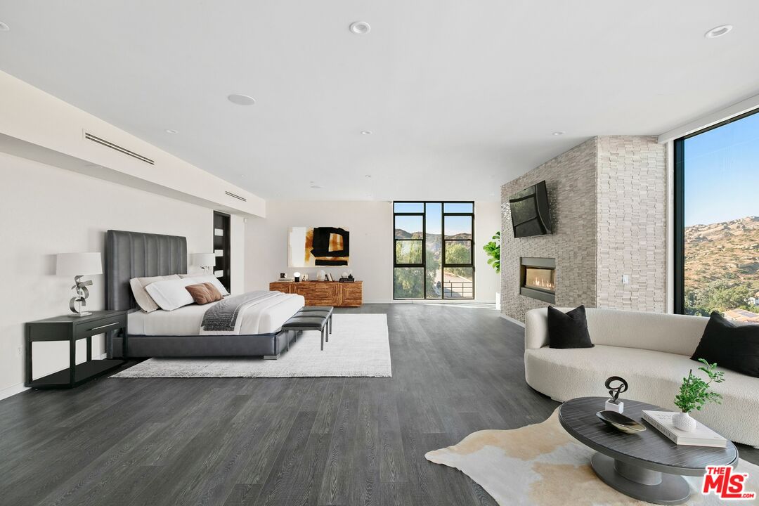 167 Saddlebow Road Bell Canyon, CA 91307 - Photo 9 of 33 a living room with furniture window and wooden floor