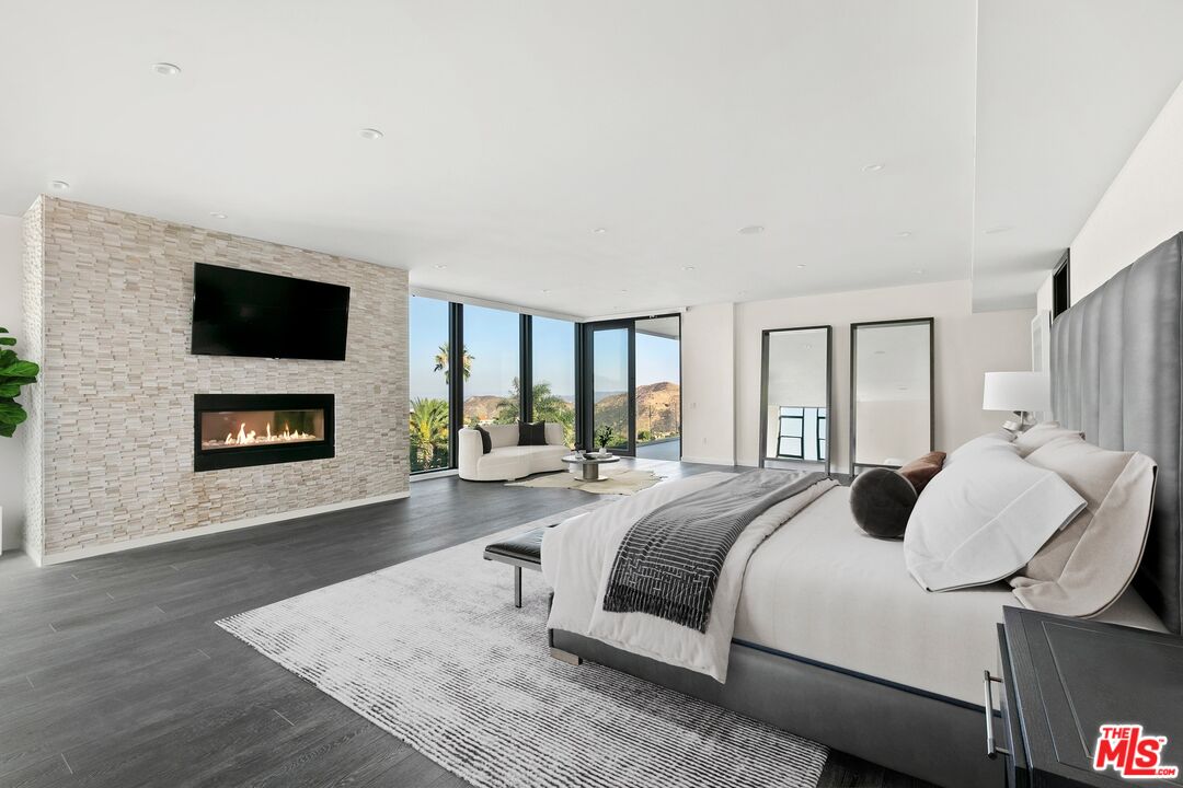 167 Saddlebow Road Bell Canyon, CA 91307 - Photo 10 of 33 a bedroom with a bed and a flat screen tv