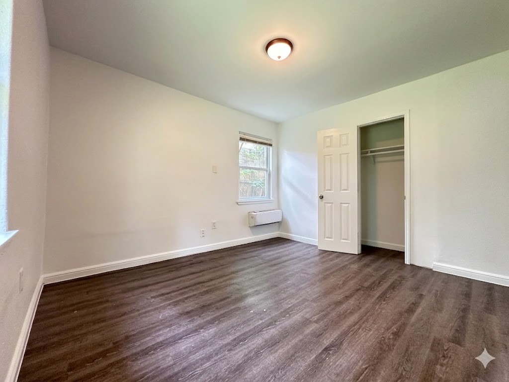 3507 Good Hope Street Houston, TX 77021 - Photo 7 of 10 Bedroom 1. Located right next to the bathroom with a window facing the backyard and another window facing the right side of the property.