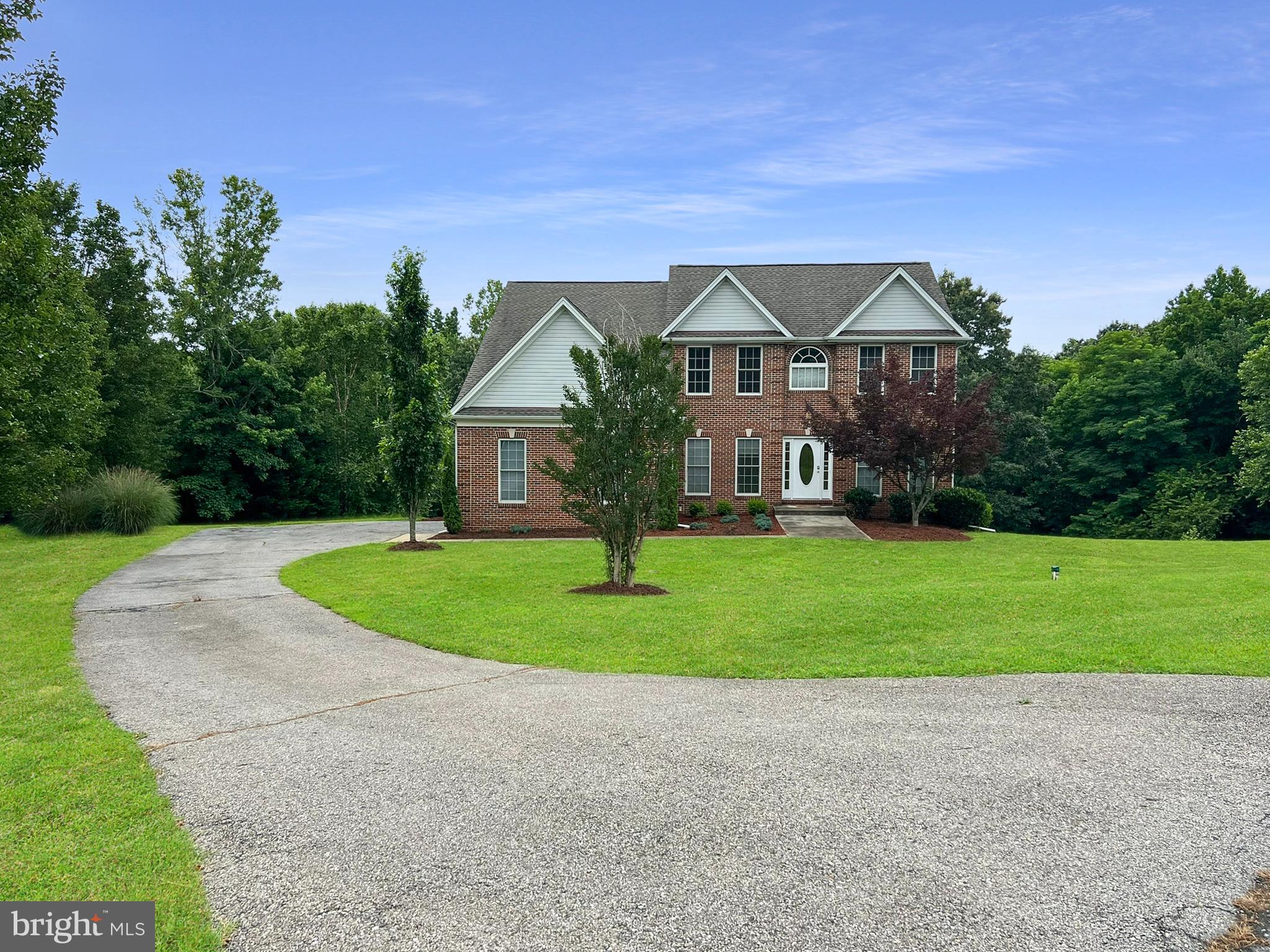 6965 Hawkins Gate Road La Plata, MD 20646 - Photo 2 of 55 a front view of house with yard and green space