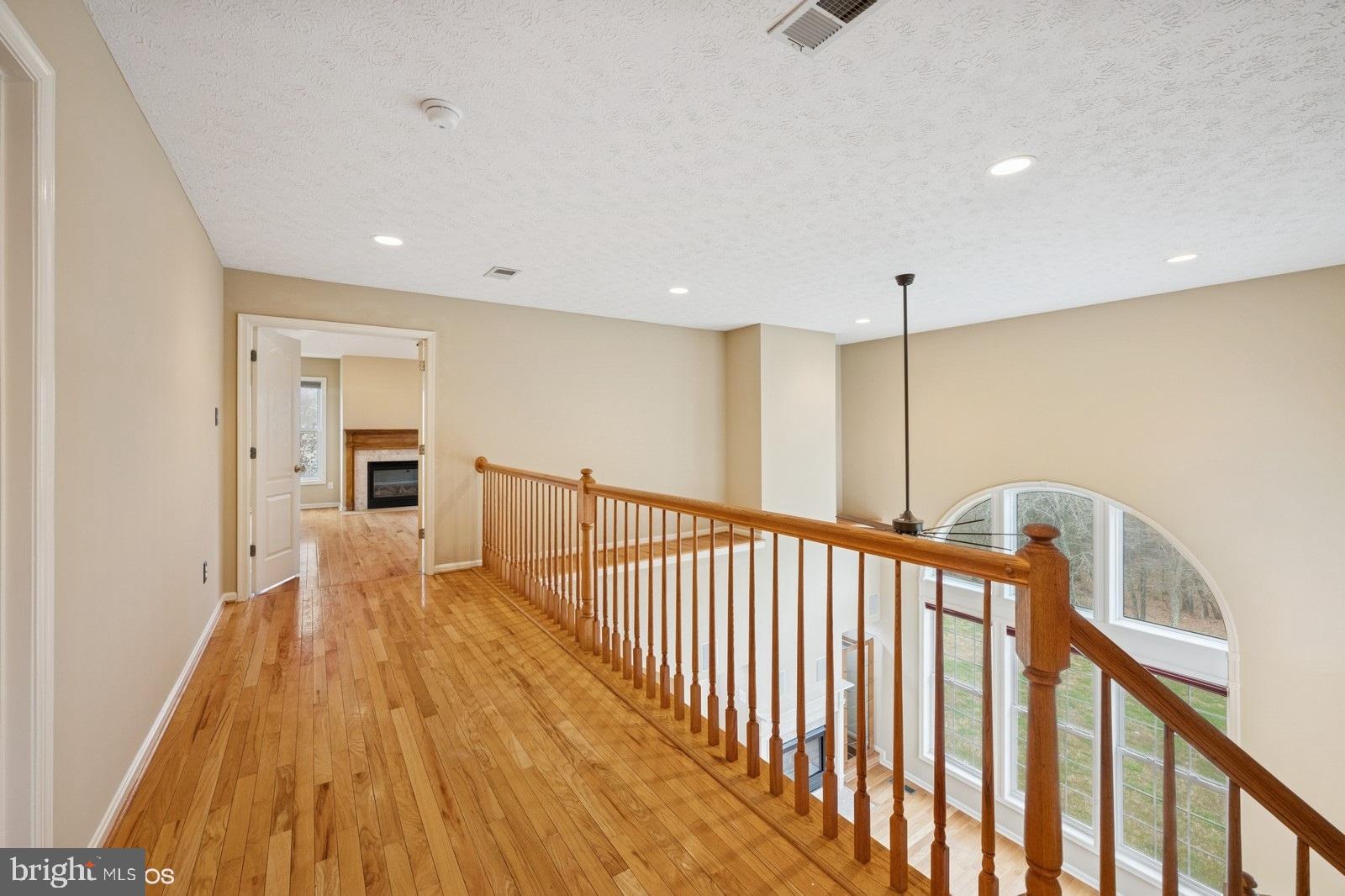 6965 Hawkins Gate Road La Plata, MD 20646 - Photo 25 of 55 a view of hallway with wooden floor