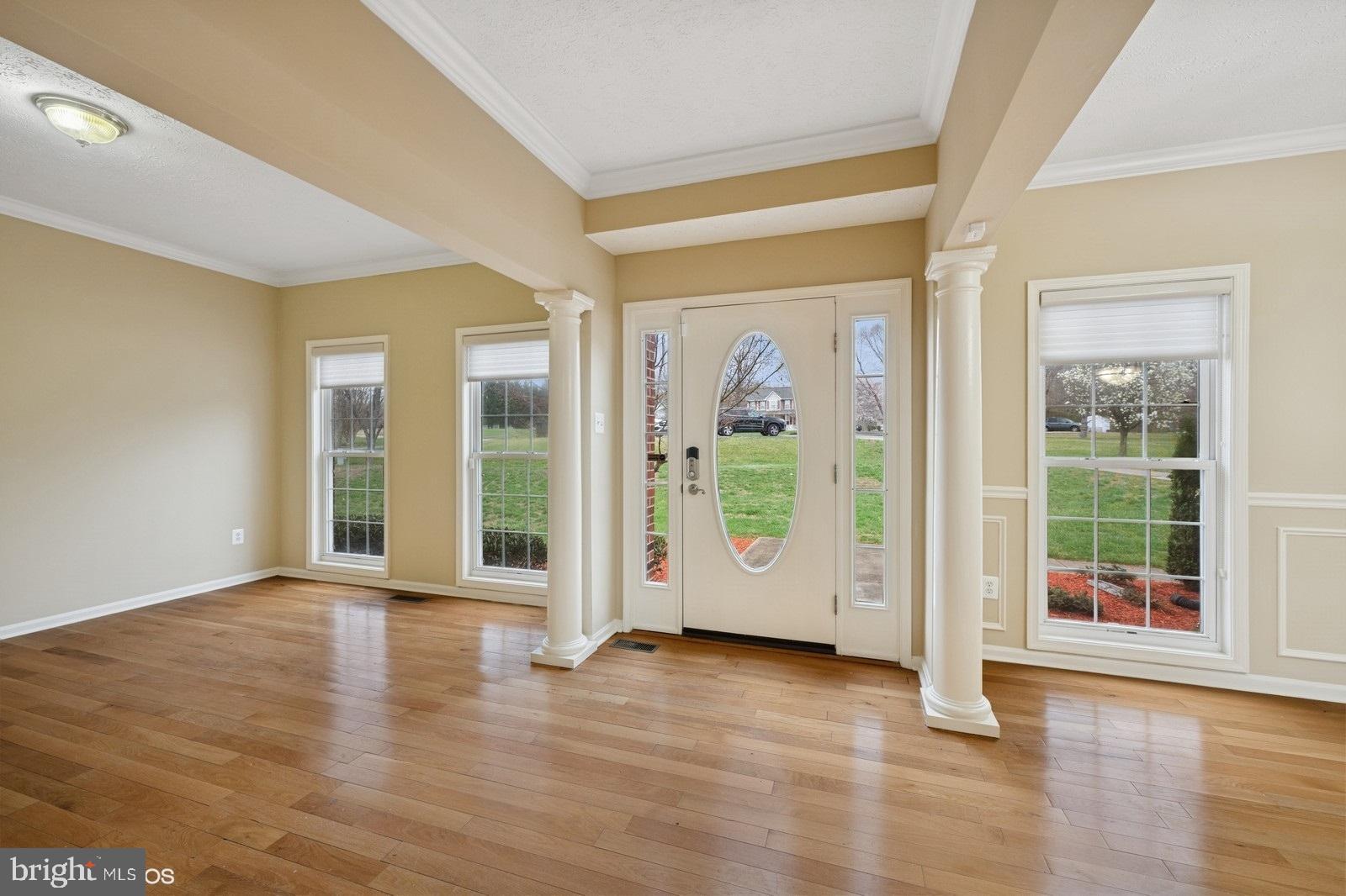 6965 Hawkins Gate Road La Plata, MD 20646 - Photo 3 of 55 a view of an entryway with wooden floor