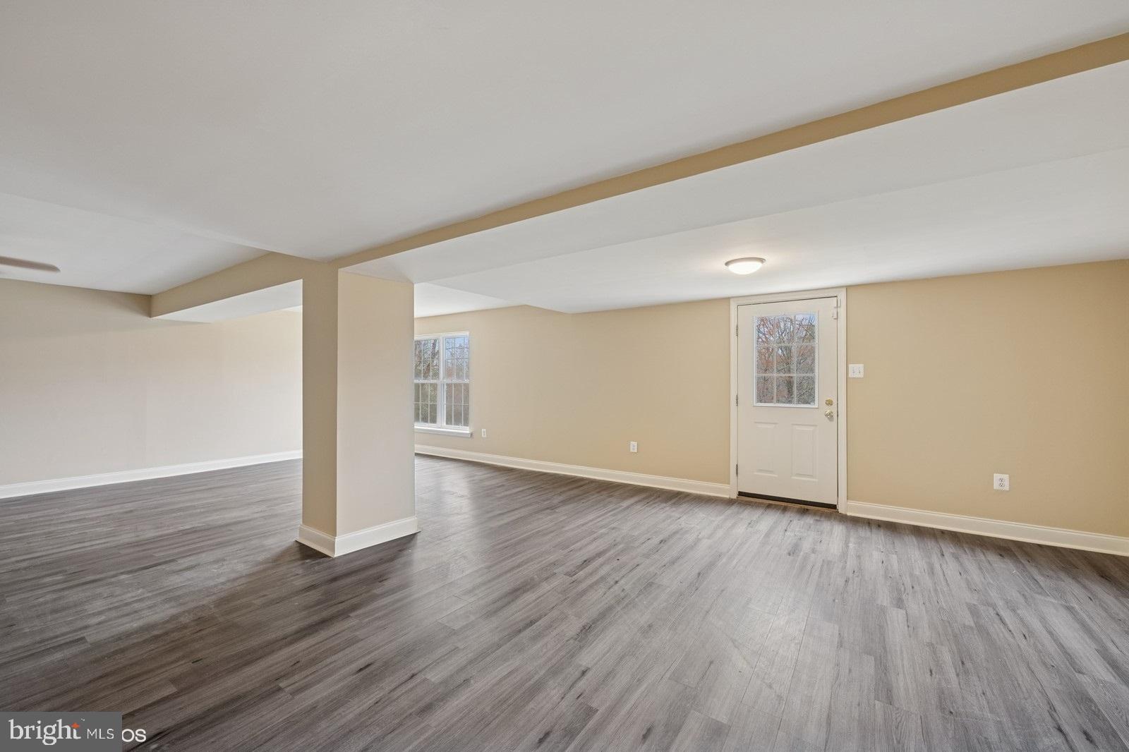 6965 Hawkins Gate Road La Plata, MD 20646 - Photo 43 of 55 a view of an empty room with wooden floor