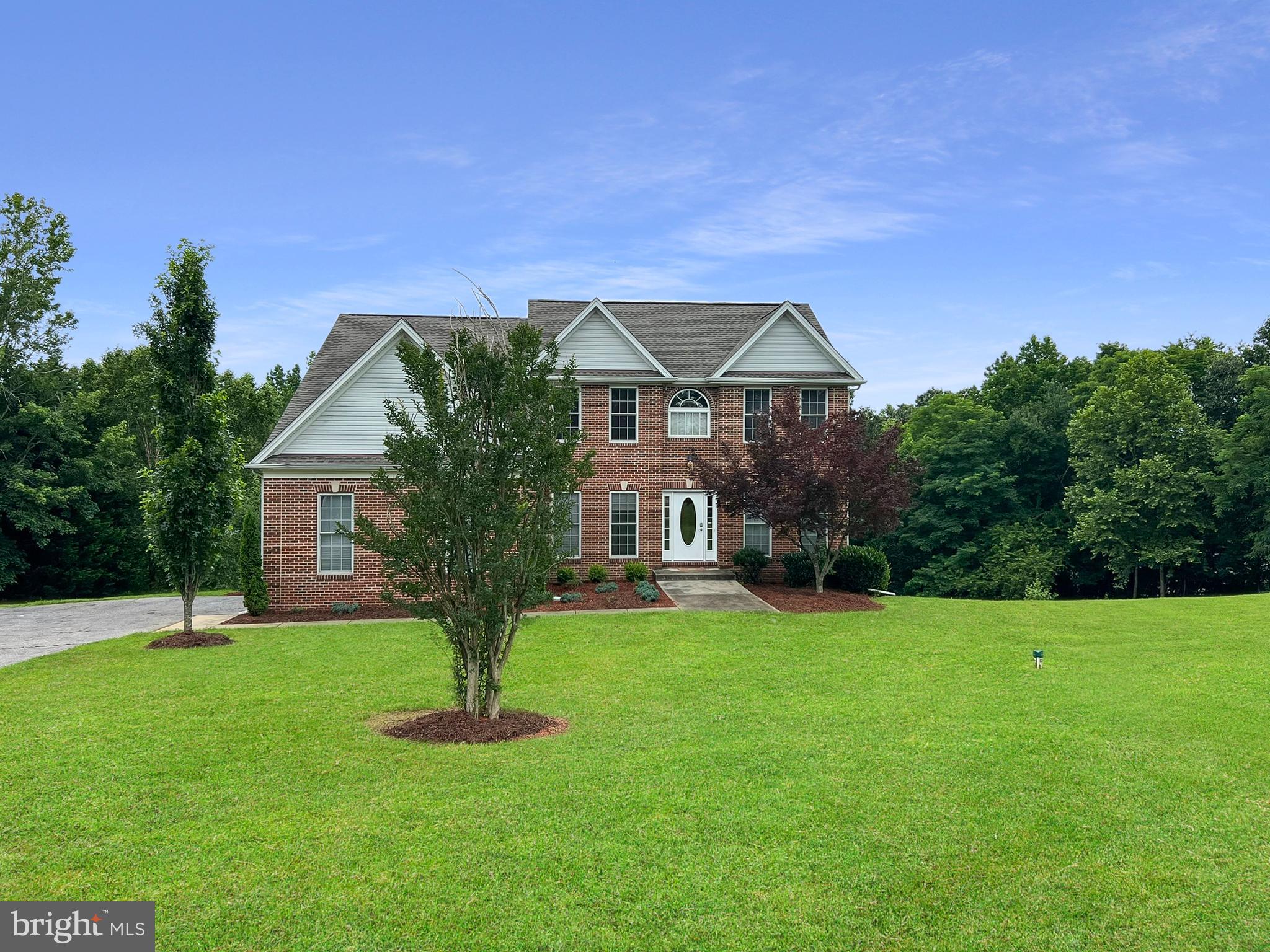 6965 Hawkins Gate Road La Plata, MD 20646 - Photo 54 of 55 a front view of a house with a yard