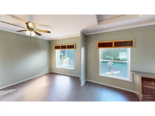 a black and white photo of a living room