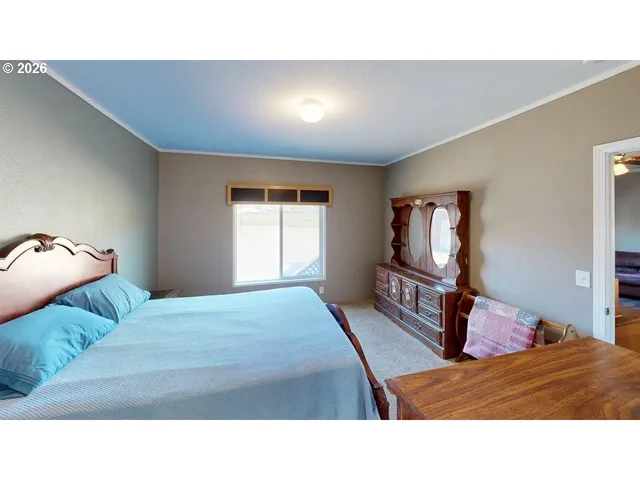a bathroom with a sink double vanity granite and a mirror