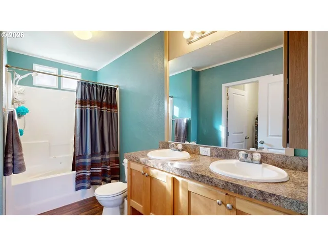 a black and white photo of a living room