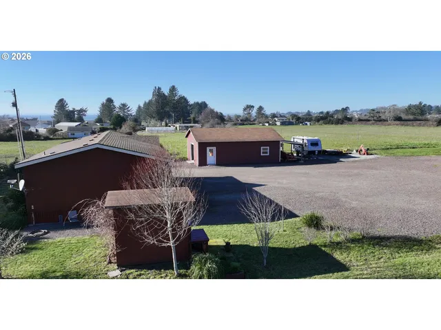 a balcony with furniture and city view