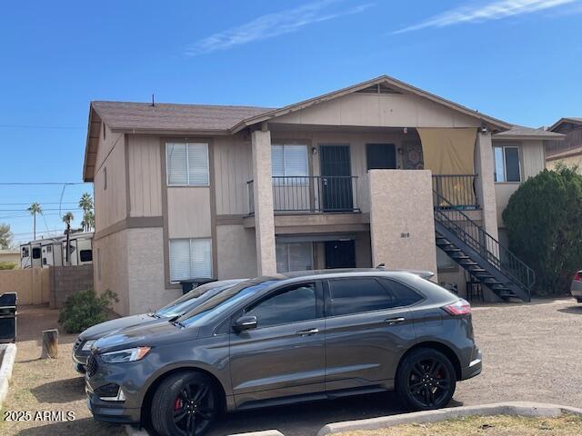 1809 N Spring, Unit 202 Mesa, AZ 85203 - Photo 4 of 4 a view of a car parked in front of a house