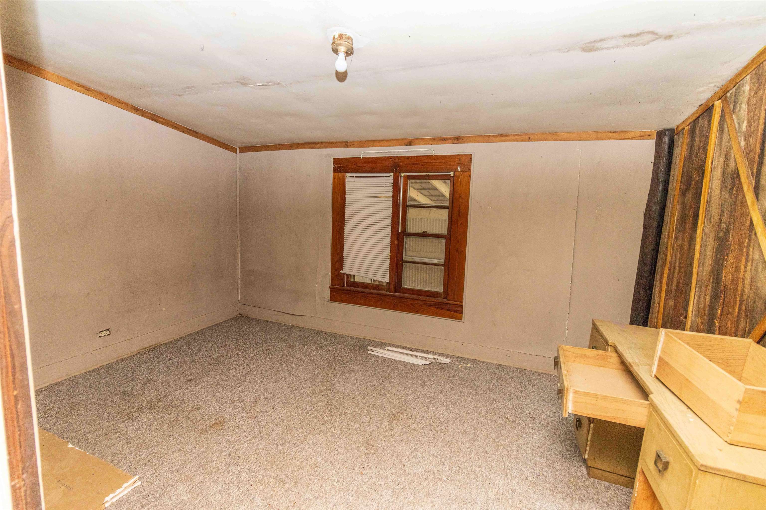 4850 Pleasant Site Road Selmer, TN 38375 - Photo 13 of 18 a view of an empty room with a window