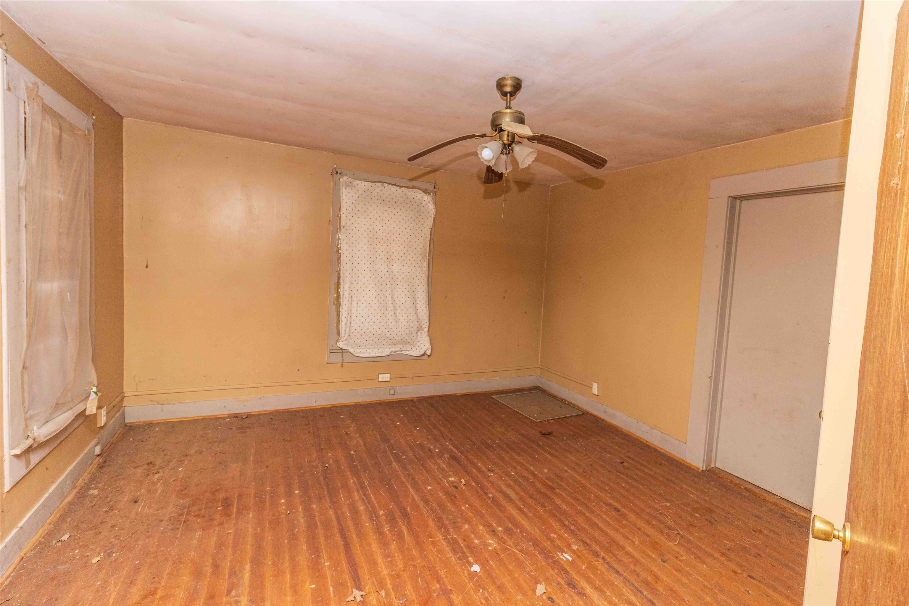 4850 Pleasant Site Road Selmer, TN 38375 - Photo 7 of 18 wooden floor in an empty room with a window