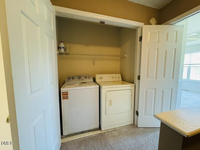 2027 Turtle Point Drive Raleigh, NC 27604 - Photo 11 of 18 a utility room with dryer and washer