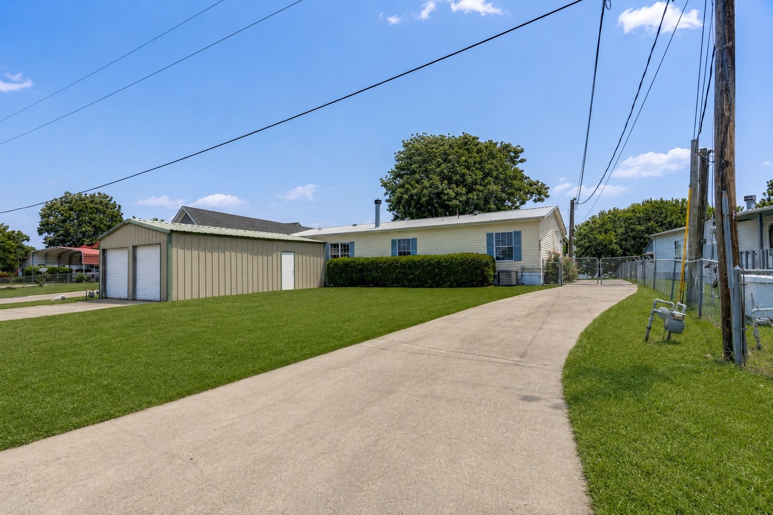 207 Vivian Road Onalaska, TX 77360 - Photo 31 of 34 a front view of a house with a yard