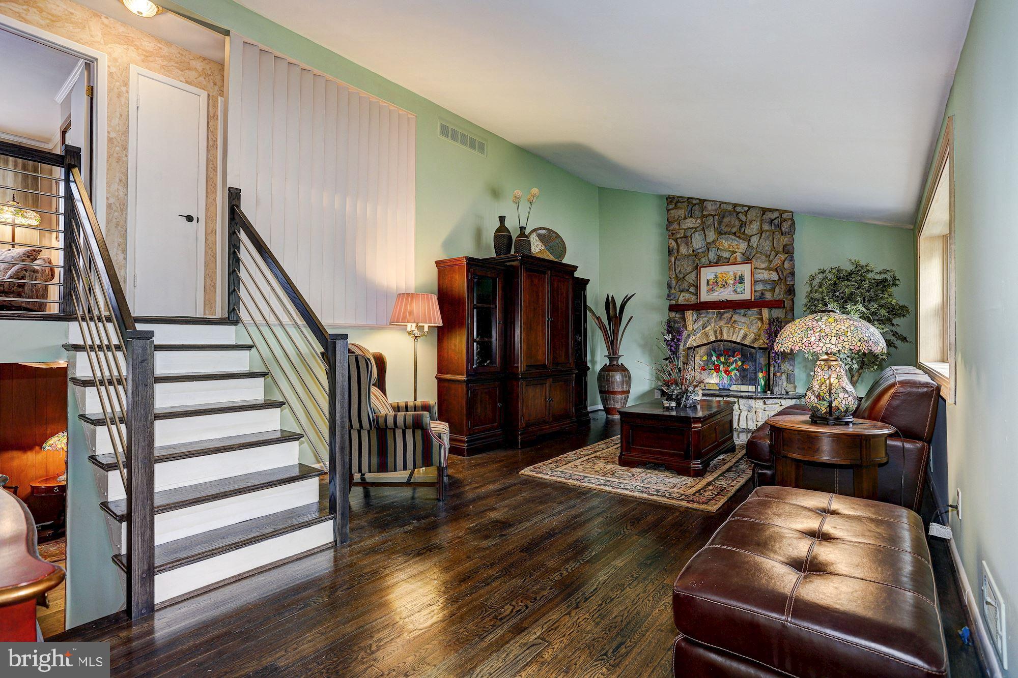 216 Radstock Road Baltimore, MD 21228 - Photo 3 of 29 Living Room with Recently Refinsihed Hardwods
