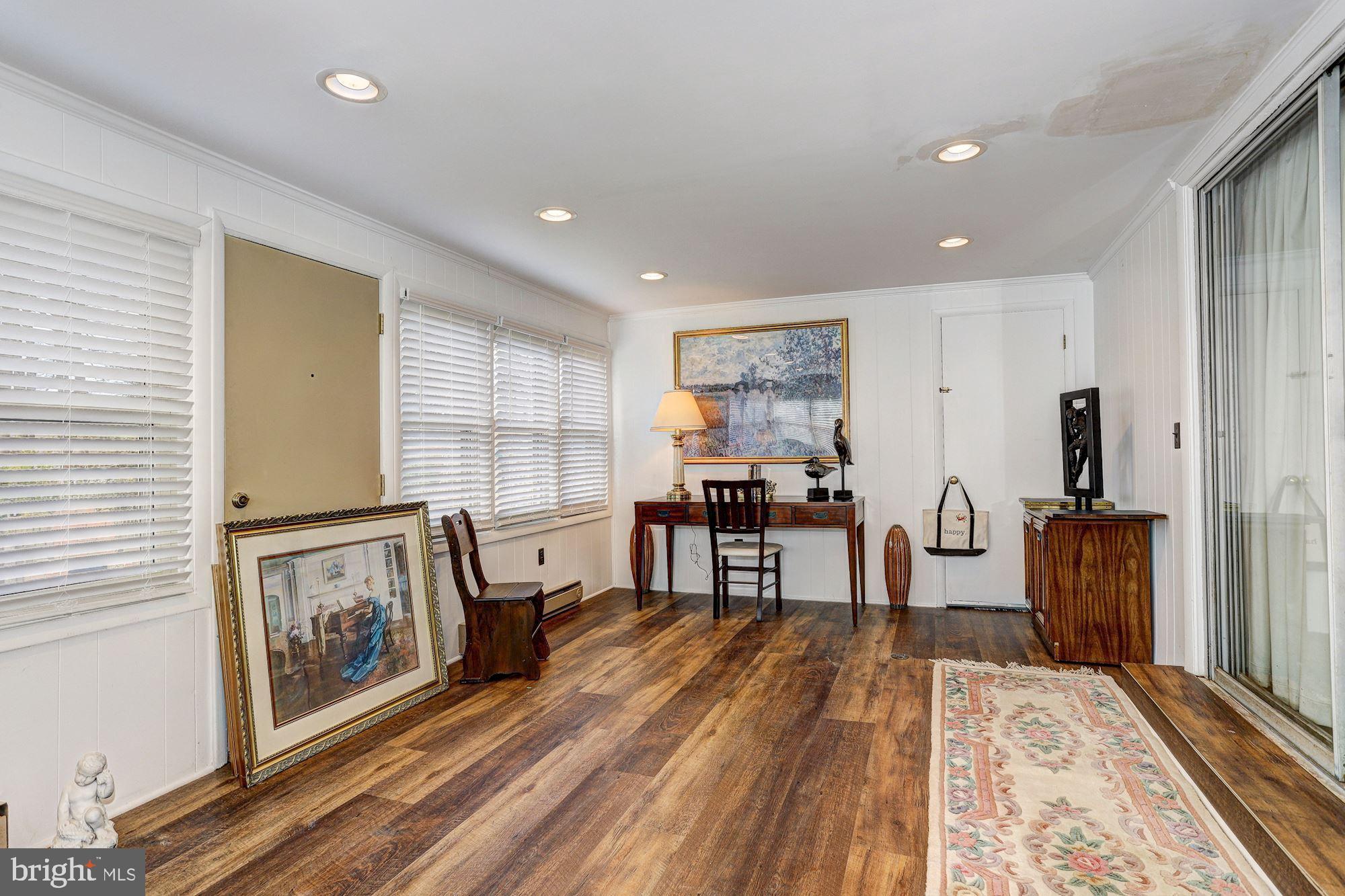 216 Radstock Road Baltimore, MD 21228 - Photo 22 of 29 Sunroom with Door to Yard