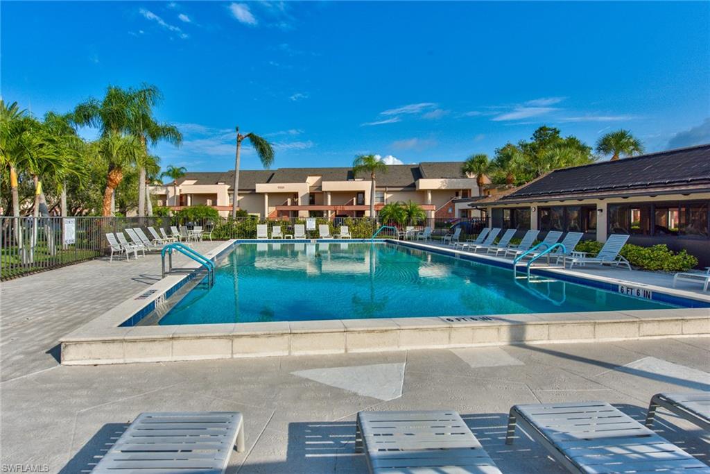 14730 Eagle Ridge Drive, Unit 122 Fort Myers, FL 33912 - Photo 25 of 27 front view of a house with a yard
