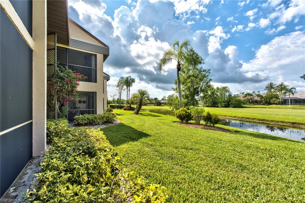 14730 Eagle Ridge Drive, Unit 122 Fort Myers, FL 33912 - Photo 27 of 27 a view of backyard with garden and entertaining space