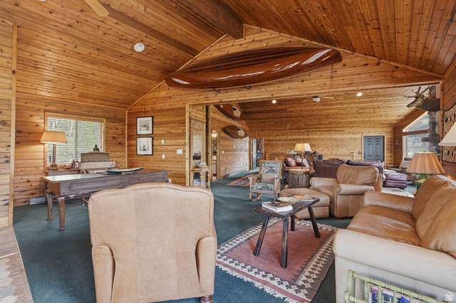 6 Beaver Springs Rancheros Oakley, UT 84055 - Photo 15 of 68 Expansive room featuring natural wood paneling throughout, vaulted wood-plank ceilings, recessed lighting, a ceiling fan, and large windows with blinds