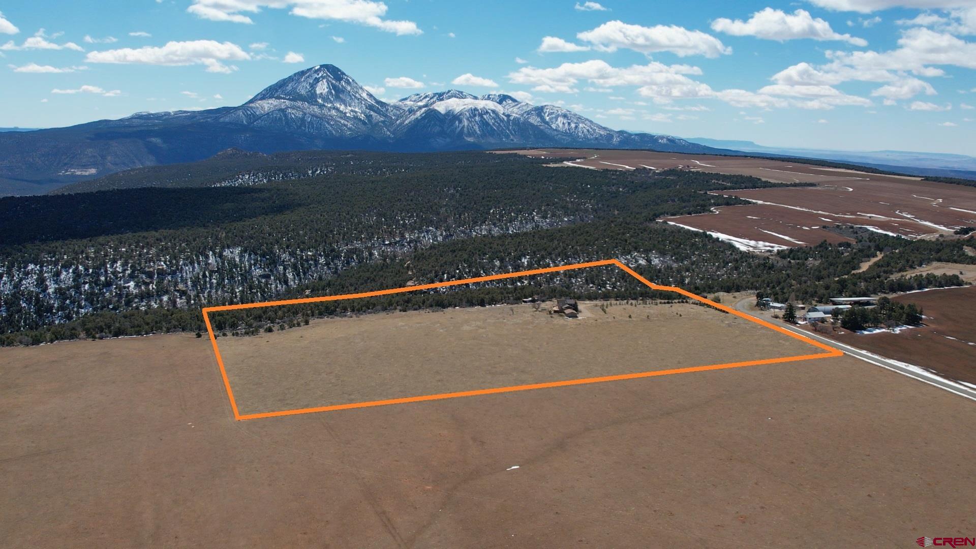 12190 Road 16 Cortez, CO 81321 - Photo 31 of 31 a view of swimming pool with mountain view