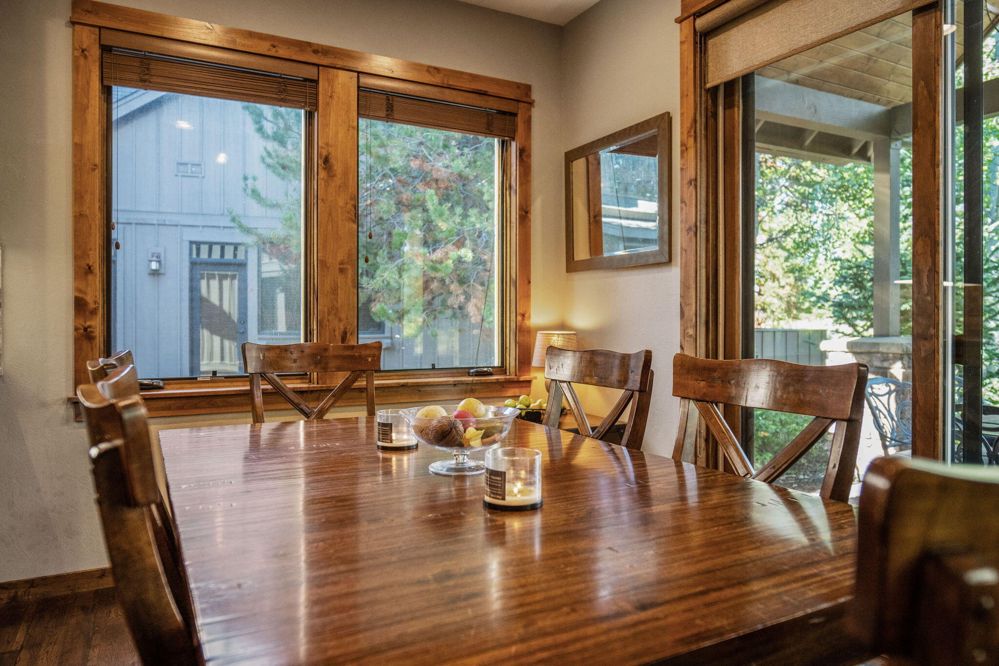 56508 Dancing Rock Loop, Unit 22 Bend, OR 97707 - Photo 21 of 69 a view of a dining room with furniture window and wooden floor