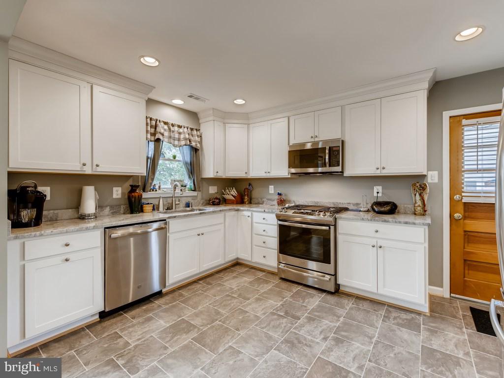 301 Winston Road Pasadena, MD 21122 - Photo 9 of 30 Stainless Steel Appliances and Granite Counters