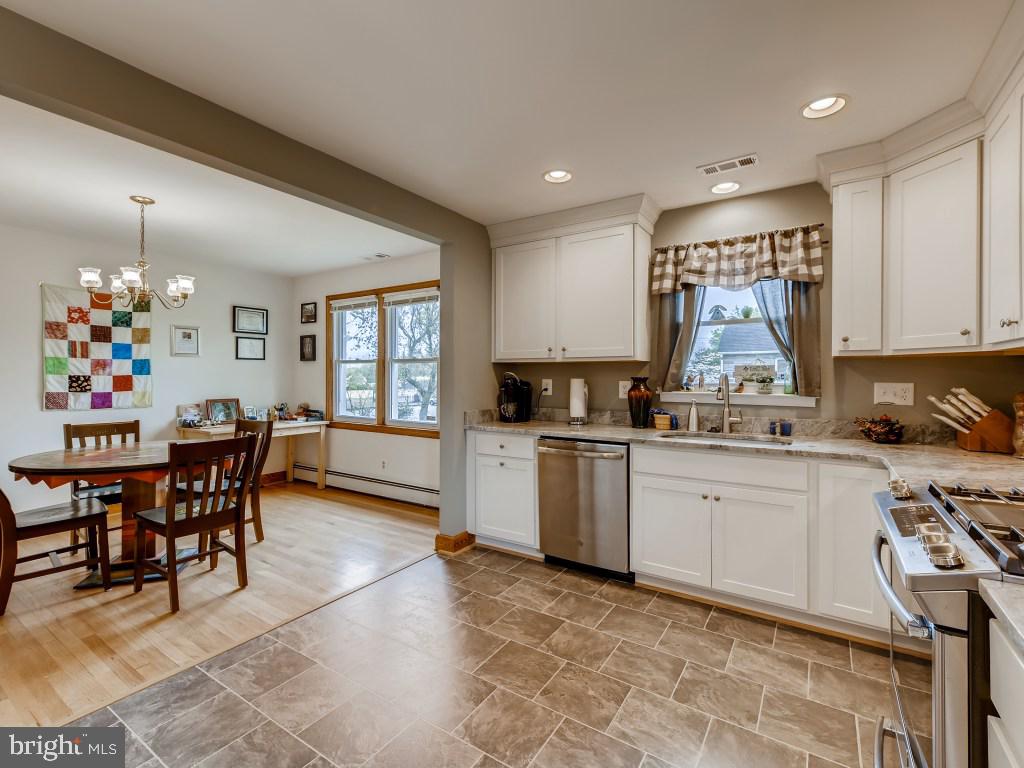 301 Winston Road Pasadena, MD 21122 - Photo 10 of 30 Bright, Sunny Kitchen and Dining Area