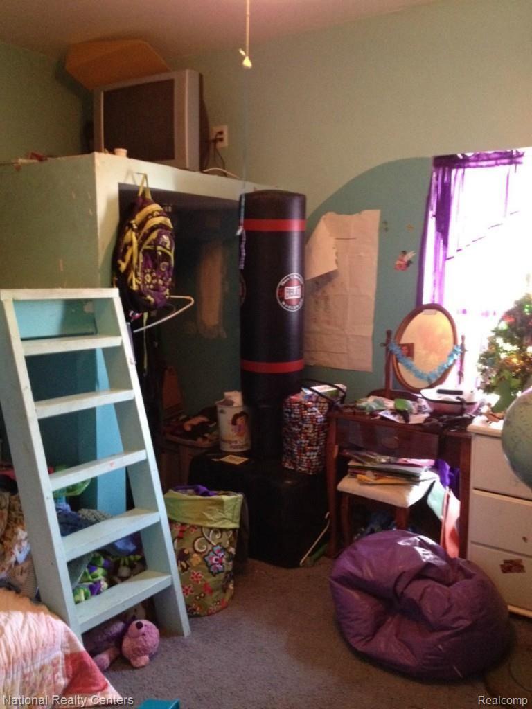 897 Chase Lake Road Howell, MI 48855 - Photo 18 of 19 Third Bedroom.jpg