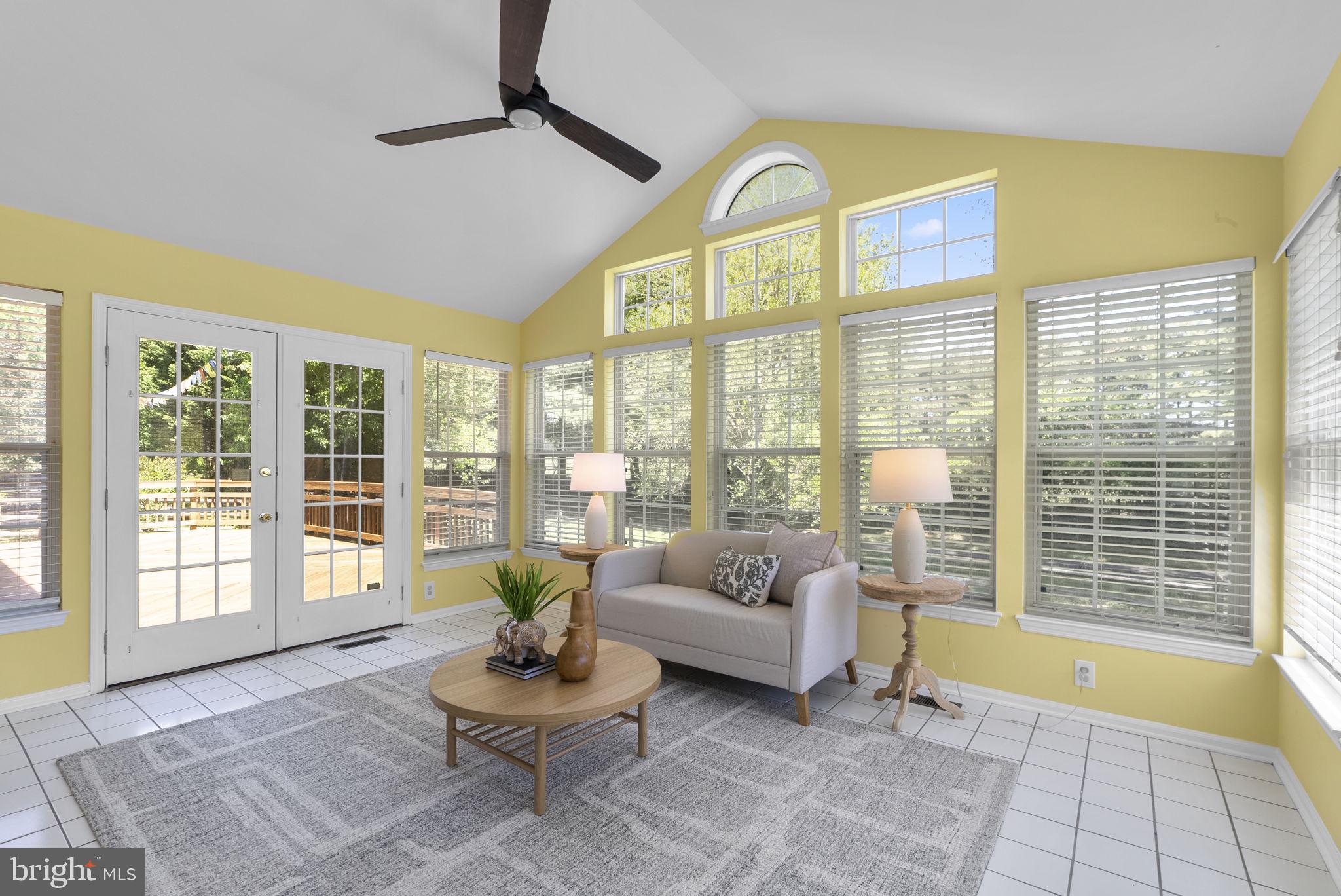 15809 Chagall Terrace North Potomac, MD 20878 - Photo 17 of 37 a living room with furniture and a large window