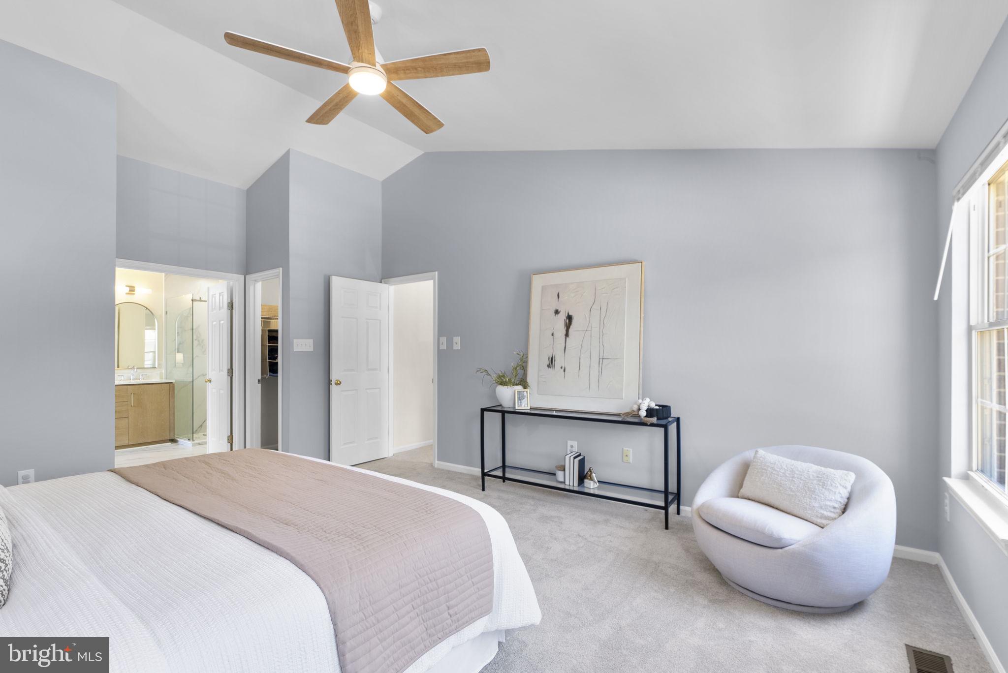 15809 Chagall Terrace North Potomac, MD 20878 - Photo 20 of 37 a bedroom with a bed and a chair