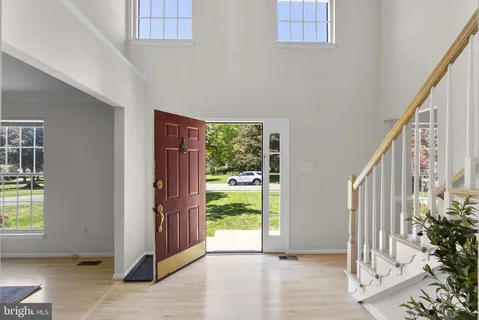 a view of a porch with wooden floor and entryway