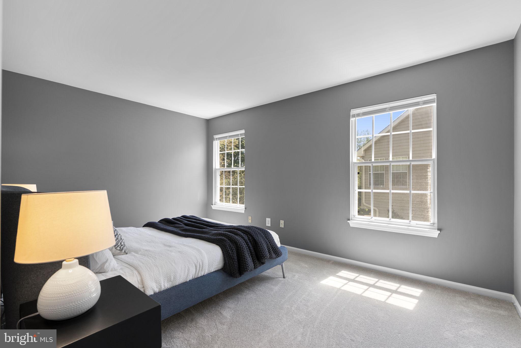 15809 Chagall Terrace North Potomac, MD 20878 - Photo 26 of 37 a bedroom with a bed and window