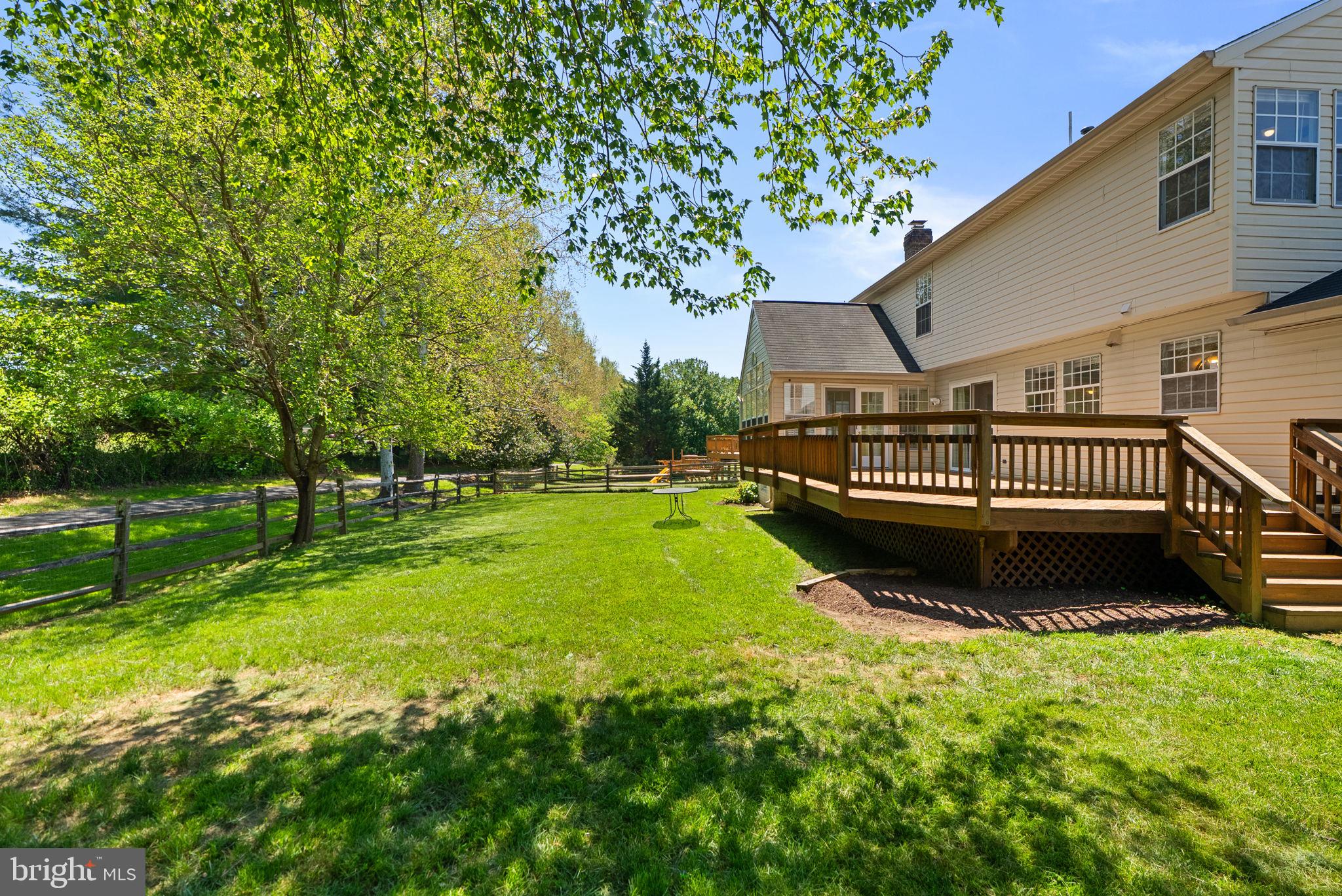 15809 Chagall Terrace North Potomac, MD 20878 - Photo 33 of 37 a view of an house with backyard space and garden