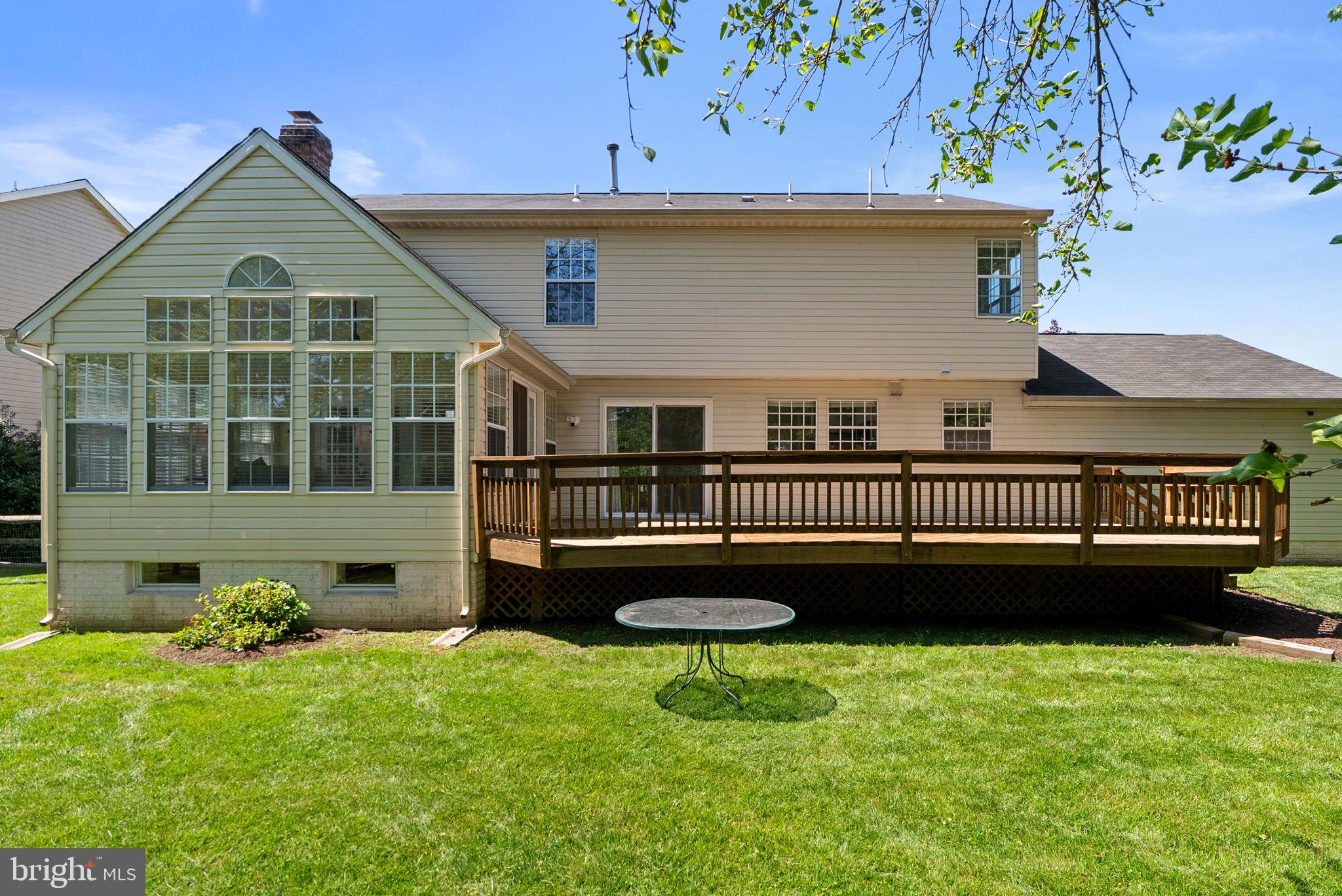 15809 Chagall Terrace North Potomac, MD 20878 - Photo 35 of 37 a view of a house with a yard