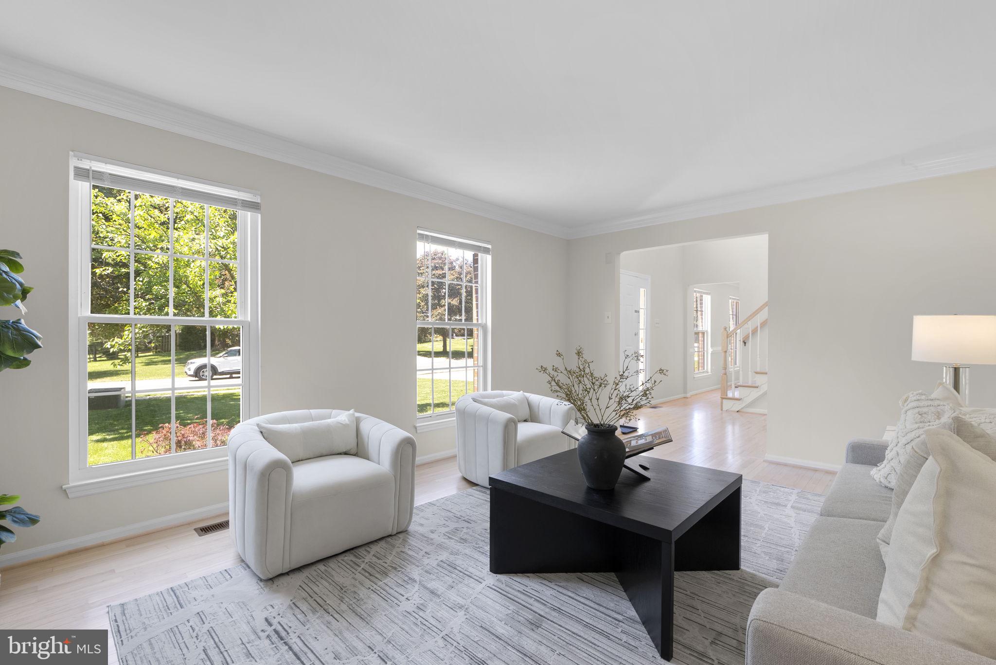 15809 Chagall Terrace North Potomac, MD 20878 - Photo 4 of 37 a living room with furniture and a large window