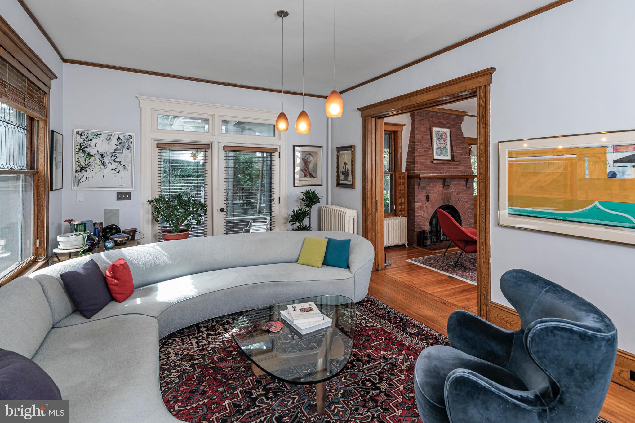 54 Hodge Road Princeton, NJ 08540 - Photo 12 of 51 a living room with furniture potted plant and a large window