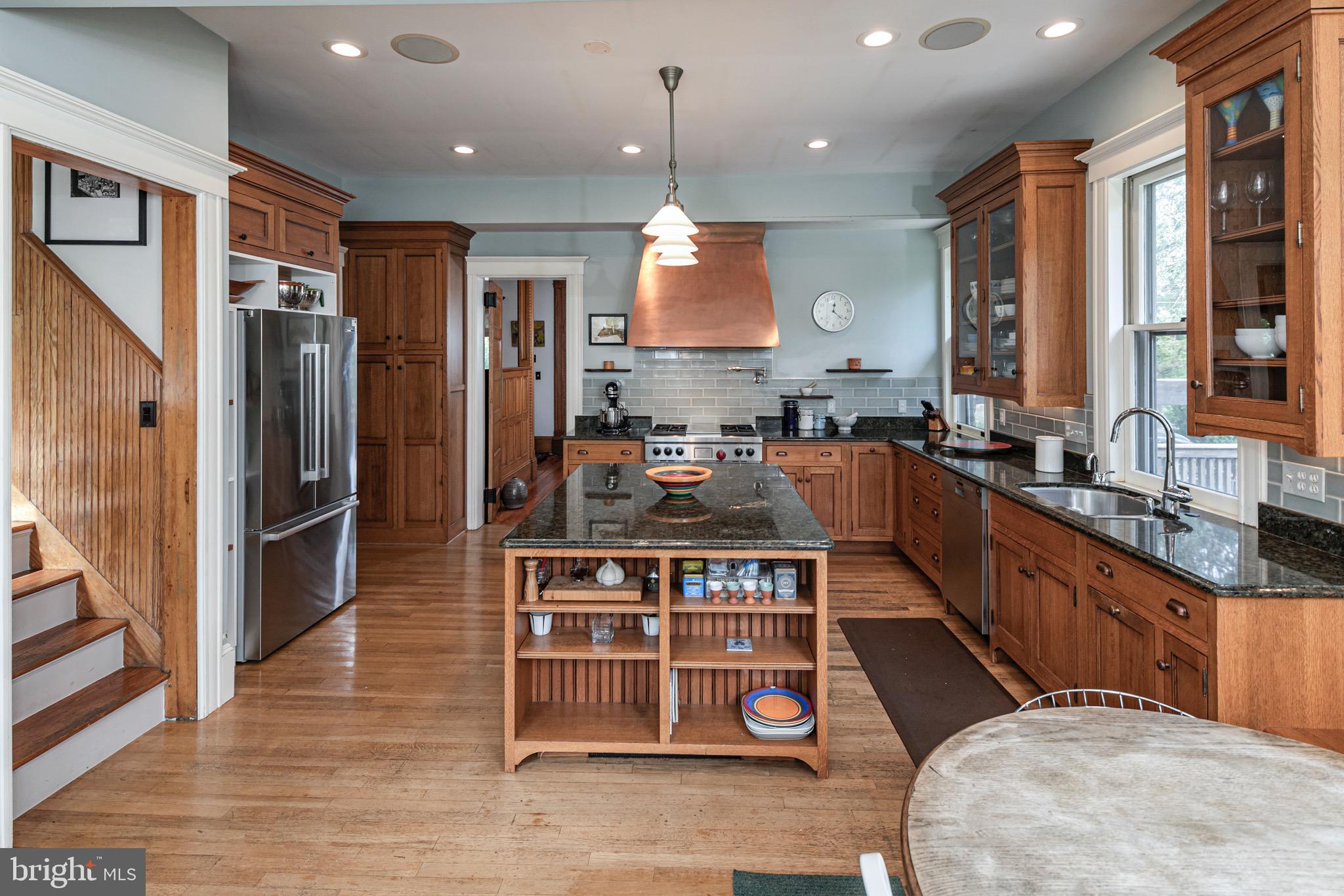 54 Hodge Road Princeton, NJ 08540 - Photo 17 of 51 a large kitchen with stainless steel appliances granite countertop a stove a sink a refrigerator and a cabinets