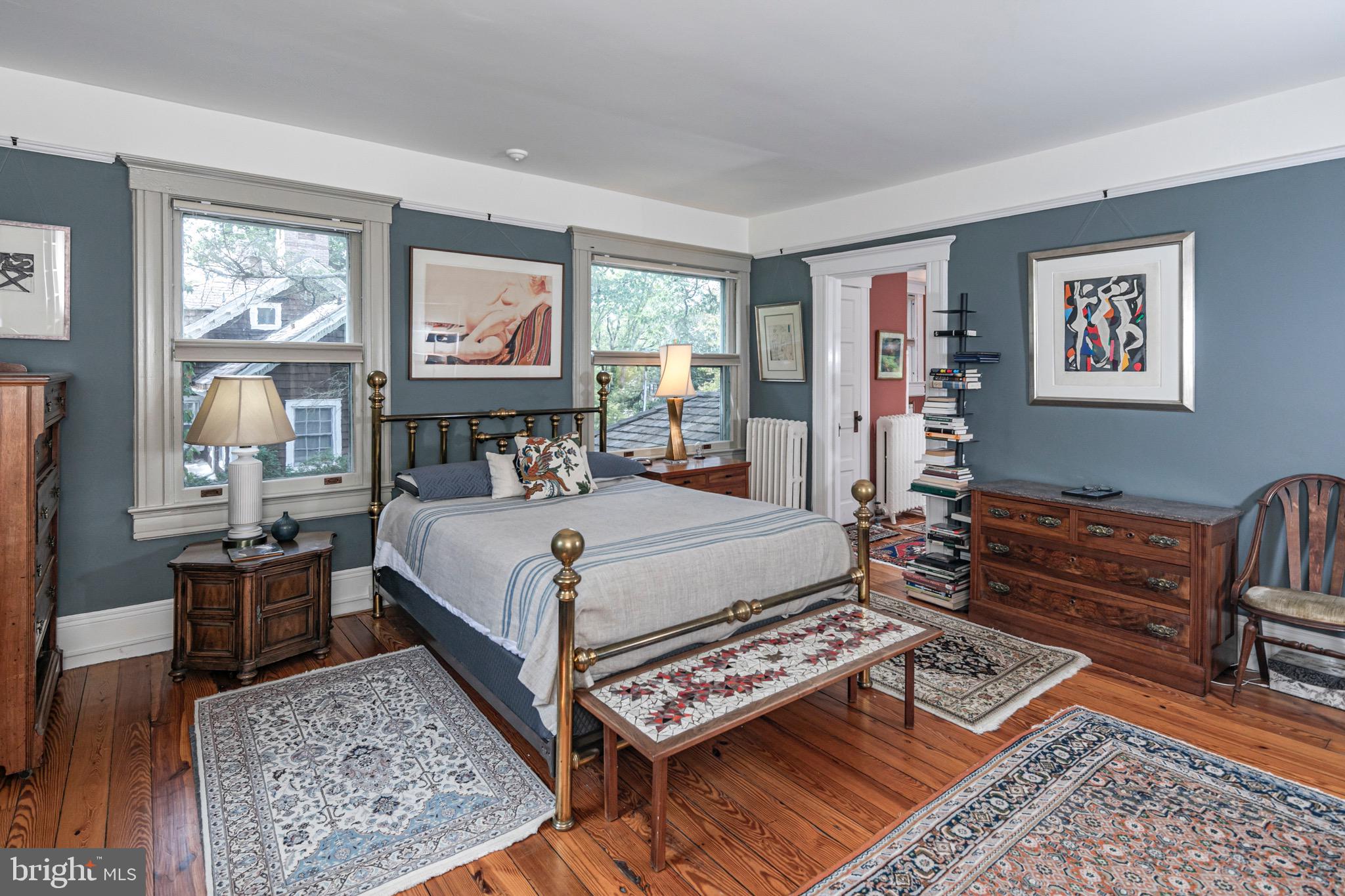 54 Hodge Road Princeton, NJ 08540 - Photo 27 of 51 a bedroom with a bed a dresser with wooden floor