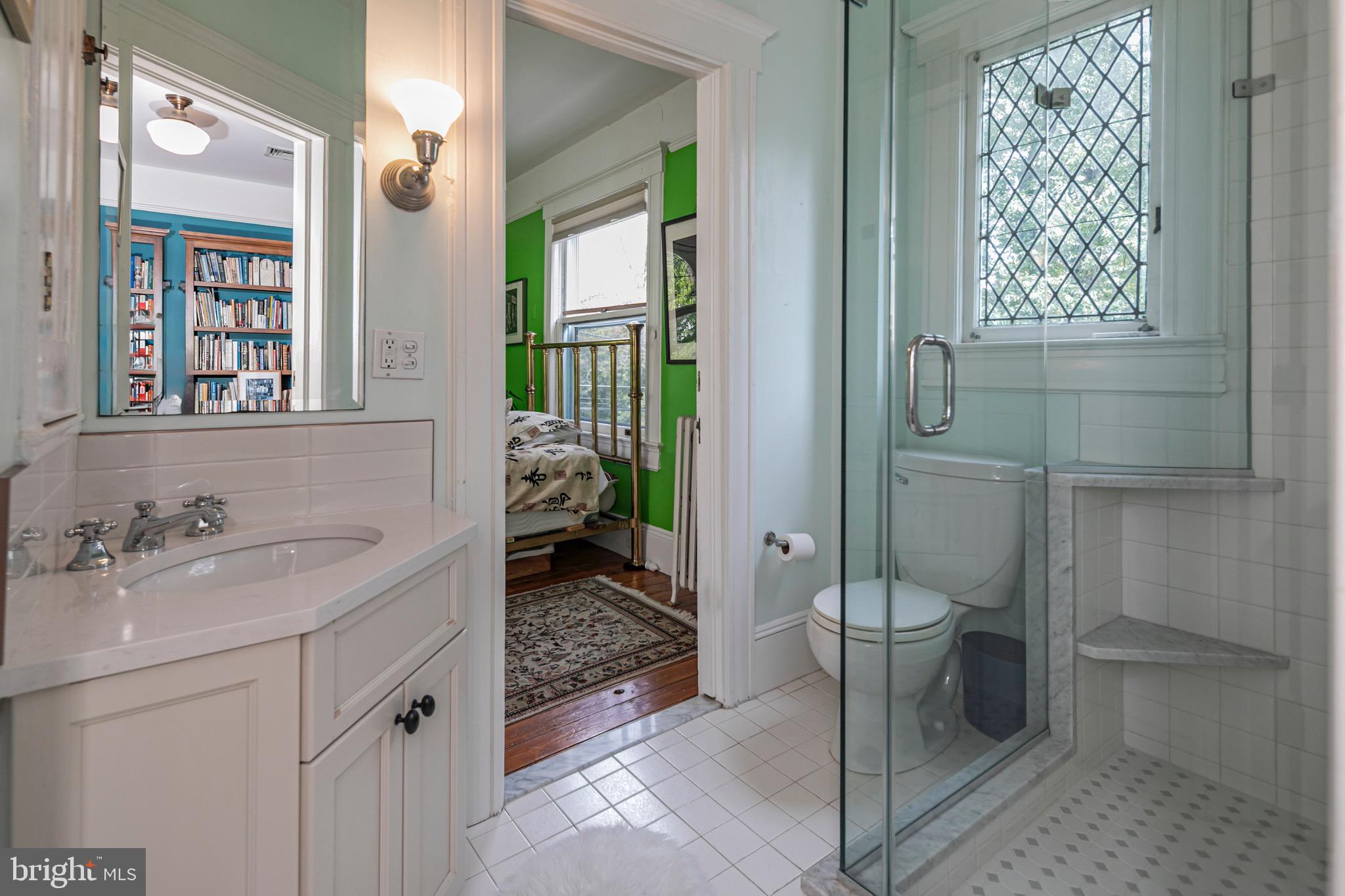 54 Hodge Road Princeton, NJ 08540 - Photo 31 of 51 a bathroom with a sink toilet and shower