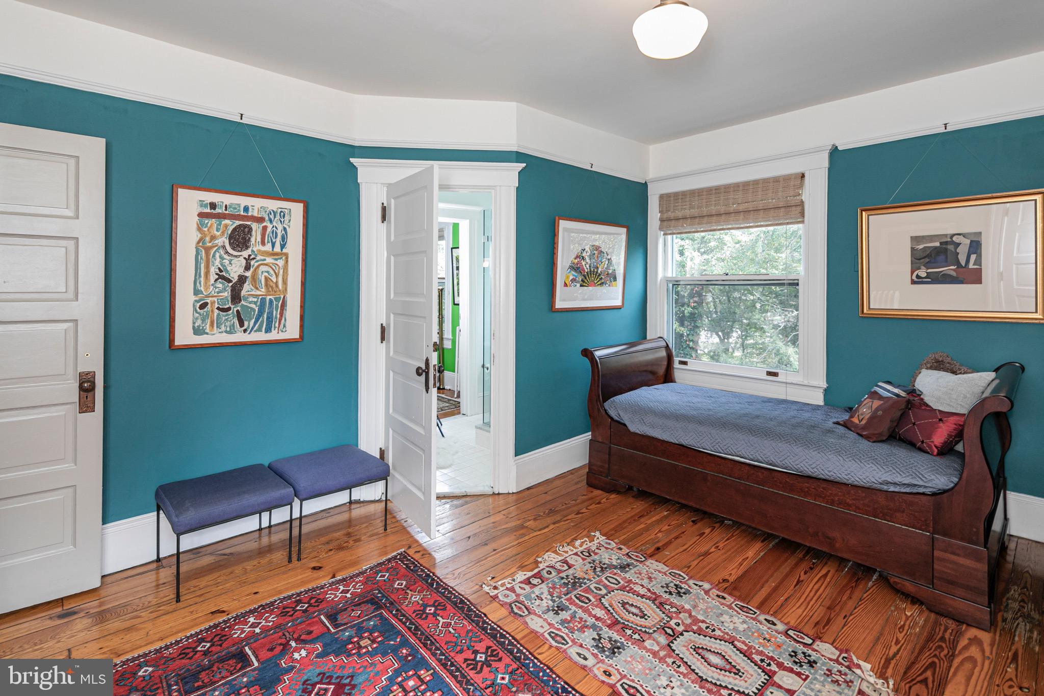 54 Hodge Road Princeton, NJ 08540 - Photo 32 of 51 a bedroom with a bed and a chair