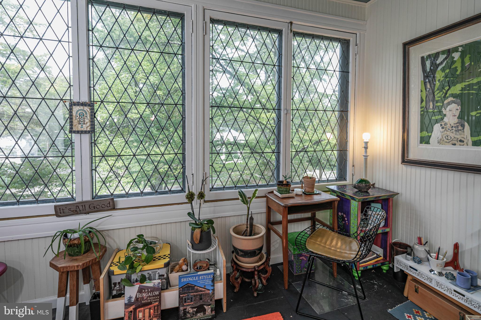 54 Hodge Road Princeton, NJ 08540 - Photo 34 of 51 a view of a dining room with furniture large windows and wooden floor