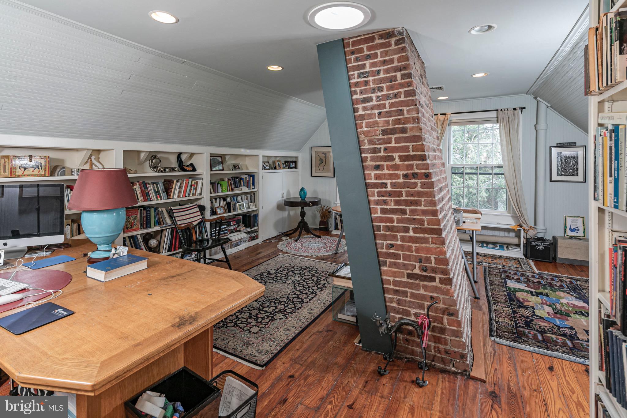 54 Hodge Road Princeton, NJ 08540 - Photo 39 of 51 a room with furniture and a book shelf