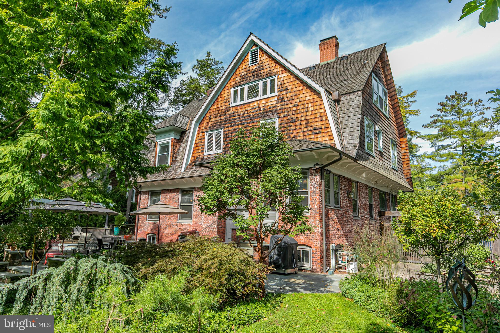54 Hodge Road Princeton, NJ 08540 - Photo 41 of 51 a view of a house with brick walls and plants