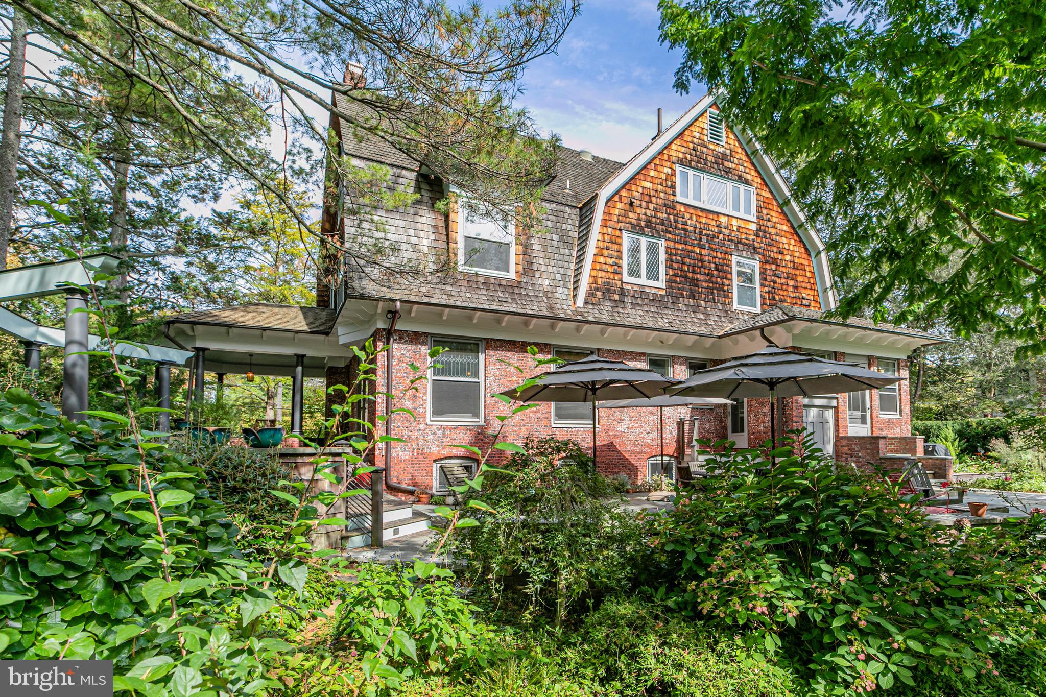 54 Hodge Road Princeton, NJ 08540 - Photo 42 of 51 a front view of a house with a garden