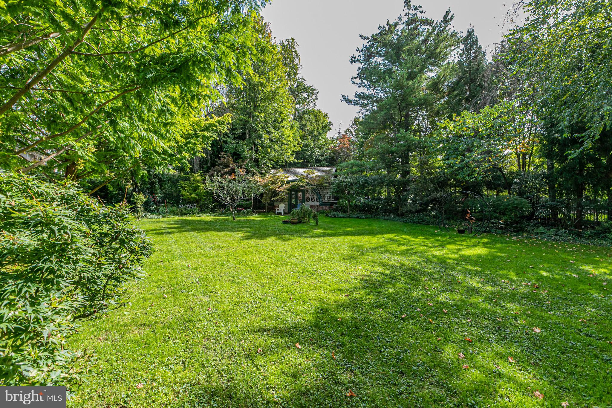 54 Hodge Road Princeton, NJ 08540 - Photo 50 of 51 a view of a backyard with a garden
