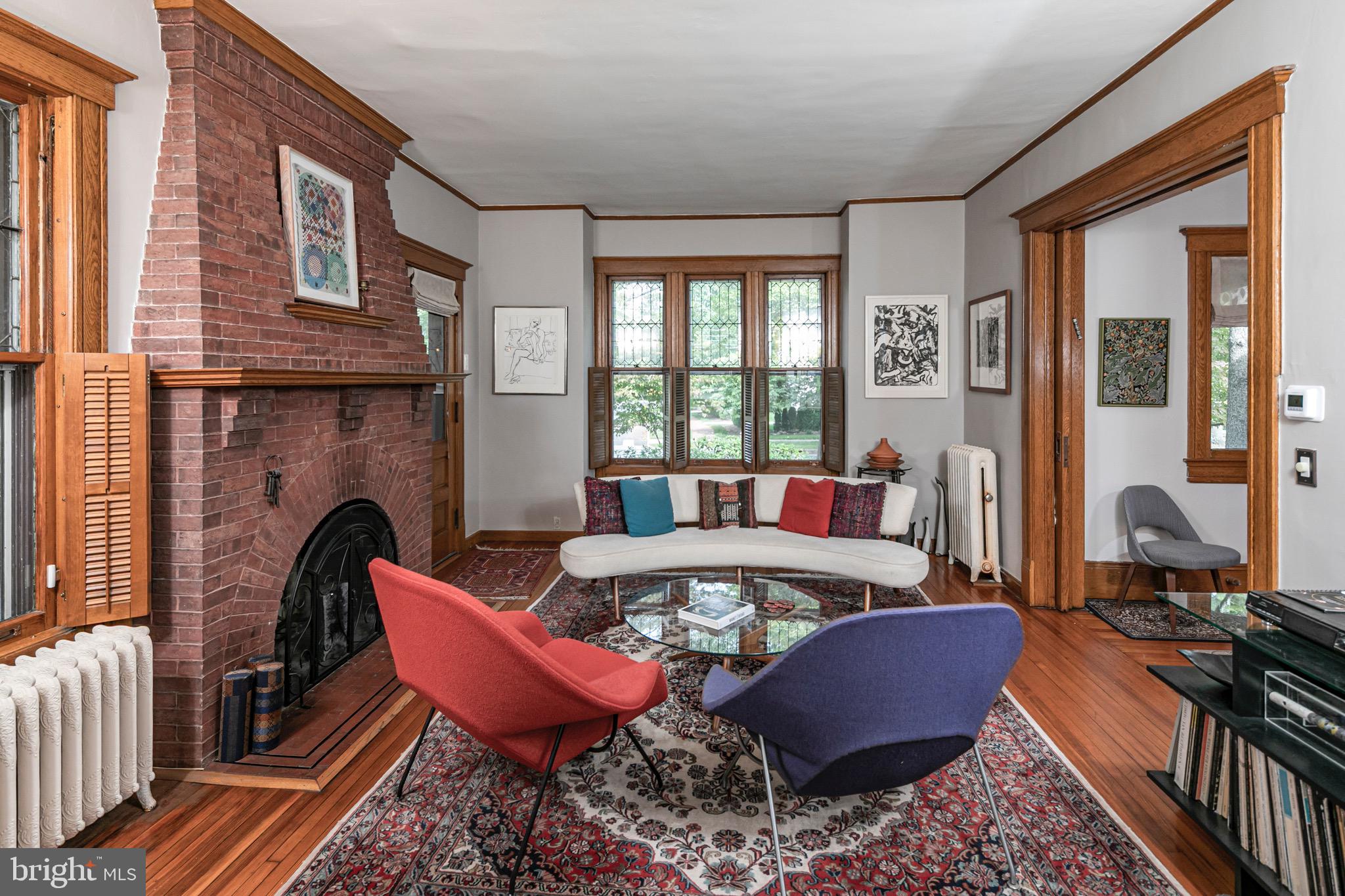 54 Hodge Road Princeton, NJ 08540 - Photo 10 of 51 a large living room with furniture and a fireplace