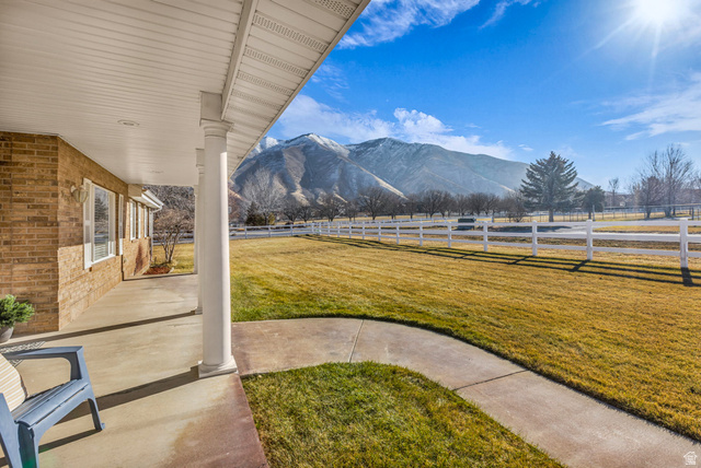 1060 West 2620th Street South Mapleton, UT 84664 - Photo 52 of 87 Fenced backyard featuring a mountain view