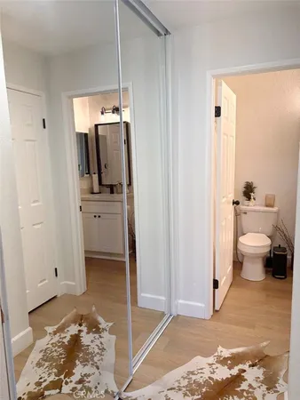 a bathroom with a toilet sink and shower